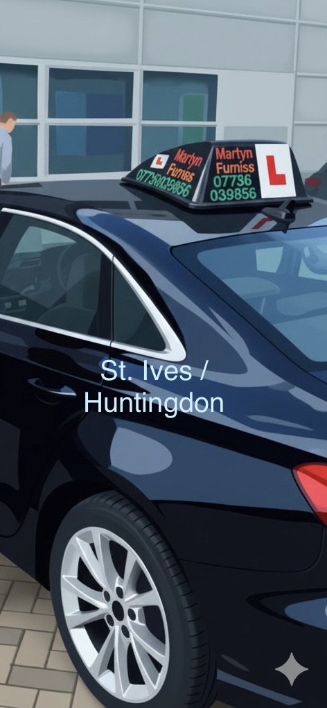 Rear of Martyn Furniss Driving School tuition car with branded roof sign